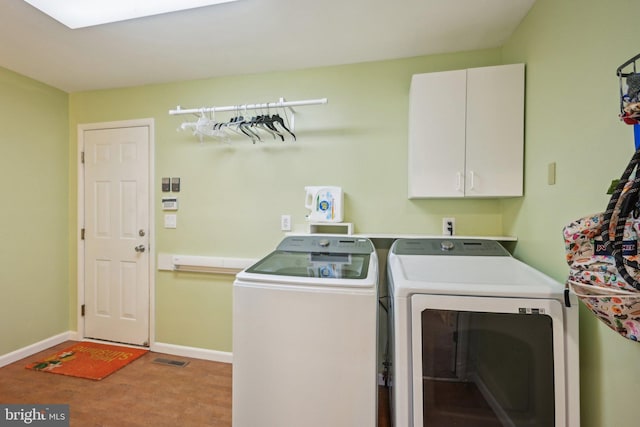 205 S Lehigh Rd, Glassboro, NJ 08028 - clothes washing area featuring visible vents, cabinet space, independent washer and dryer, and baseboards