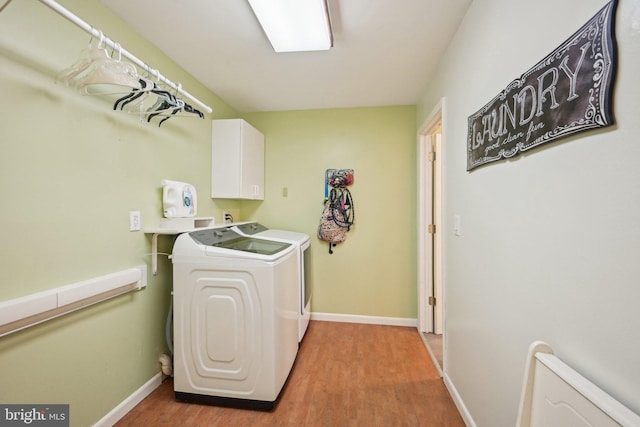 205 S Lehigh Rd, Glassboro, NJ 08028 - laundry area with light wood-style flooring, cabinet space, independent washer and dryer, and baseboards