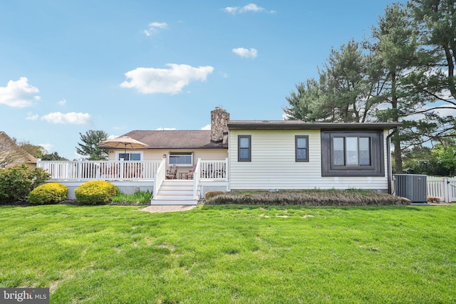 205 S Lehigh Rd, Glassboro, NJ 08028 - back of property with a chimney, a yard, central AC unit, and a deck