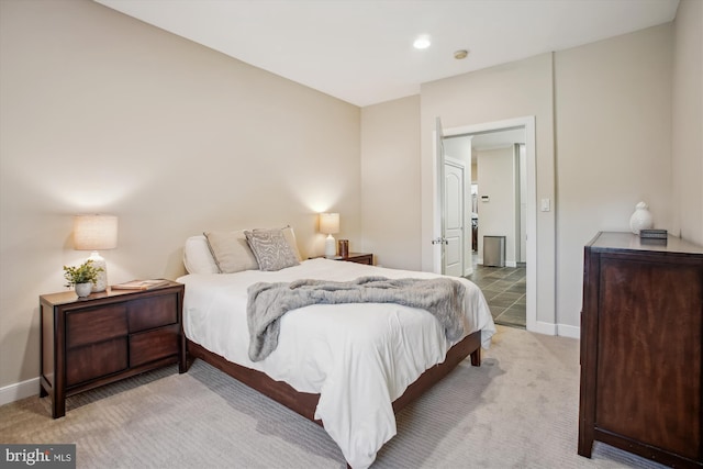 carpeted bedroom with baseboards and recessed lighting