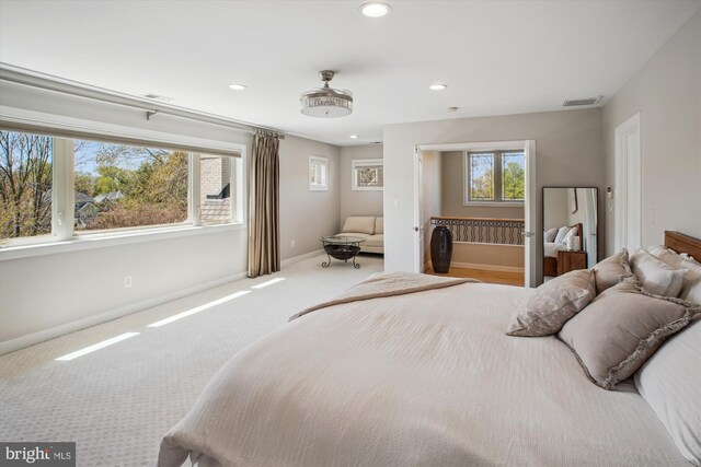 bedroom featuring baseboards, visible vents, recessed lighting, and carpet flooring