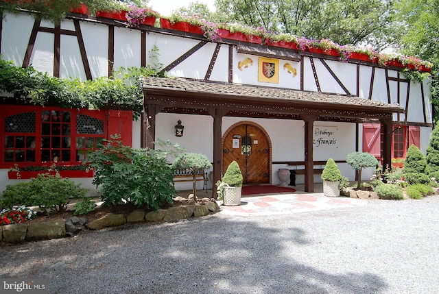 exterior space with stucco siding