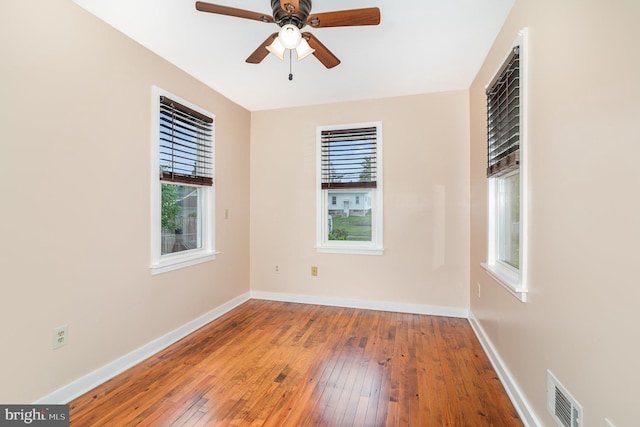 4403 Lancaster St, Harrisburg, PA 17111 - spare room featuring wood-type flooring, baseboards, and a ceiling fan