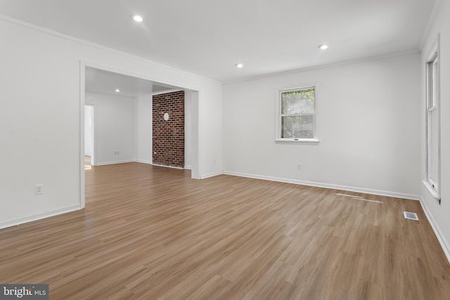 5235 Chalk Point Rd, West River, MD 20778 - unfurnished living room featuring light wood-style flooring, ornamental molding, baseboards, and recessed lighting