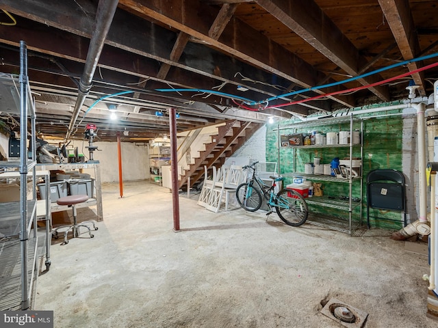 unfinished basement with stairway