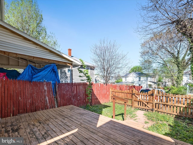 wooden deck featuring fence private yard