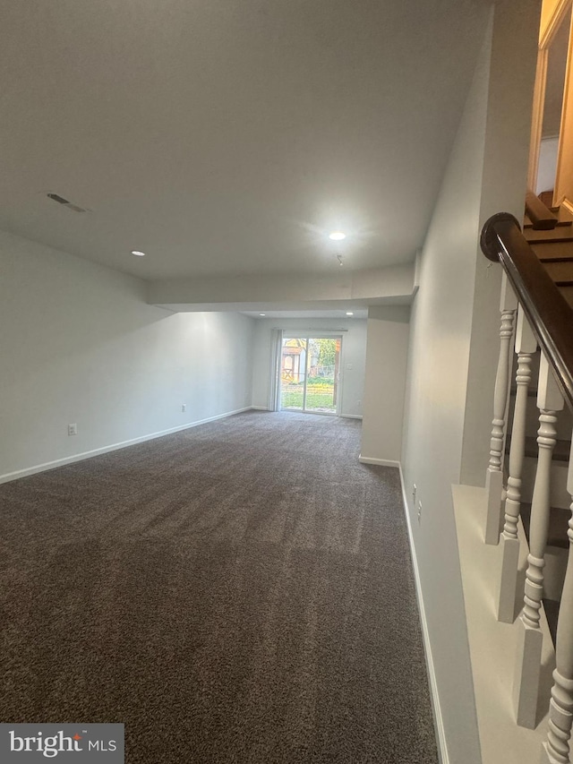 empty room featuring recessed lighting, baseboards, visible vents, and carpet floors