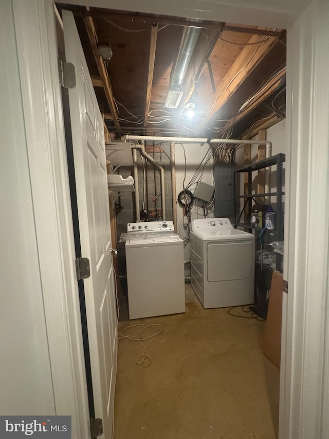 laundry room with washing machine and dryer and laundry area