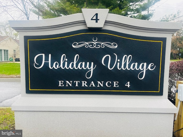 view of community sign