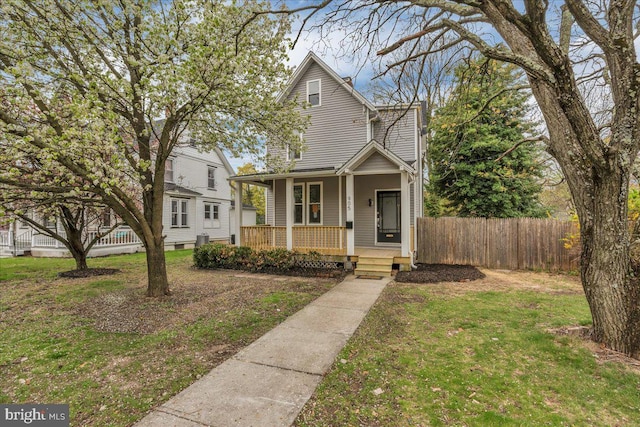 905 Cooper, Edgewater Park, NJ 08010 - view of front facade with a front lawn, covered porch, and fence