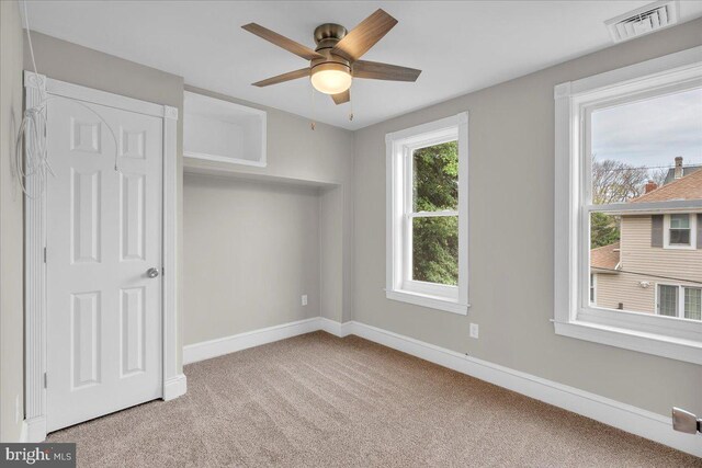 905 Cooper, Edgewater Park, NJ 08010 - unfurnished bedroom with baseboards, a ceiling fan, visible vents, and carpet floors