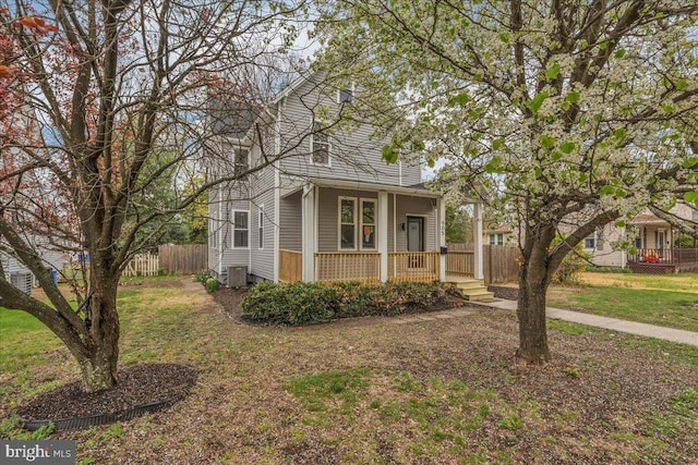 905 Cooper, Edgewater Park, NJ 08010 - view of front of property featuring central air condition unit, a porch, a chimney, fence, and a front yard