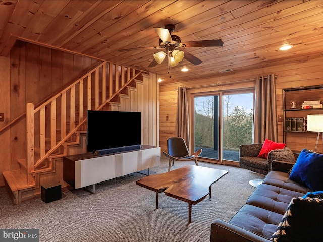 2201 Mill Gap Rd, Lost City, WV 26810 - carpeted living area featuring stairway, wooden ceiling, and wooden walls