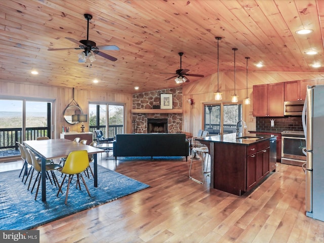 2201 Mill Gap Rd, Lost City, WV 26810 - kitchen featuring stainless steel appliances, a ceiling fan, wooden ceiling, a sink, and open floor plan