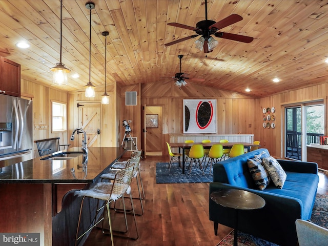 2201 Mill Gap Rd, Lost City, WV 26810 - living room with wood ceiling, wooden walls, and ceiling fan
