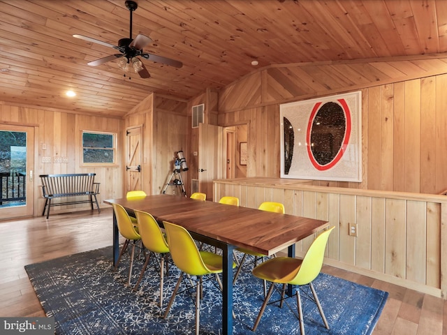 2201 Mill Gap Rd, Lost City, WV 26810 - dining space with wooden ceiling, wood walls, wood-type flooring, and vaulted ceiling