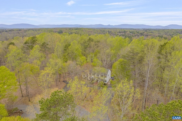 property view of mountains with a forest view