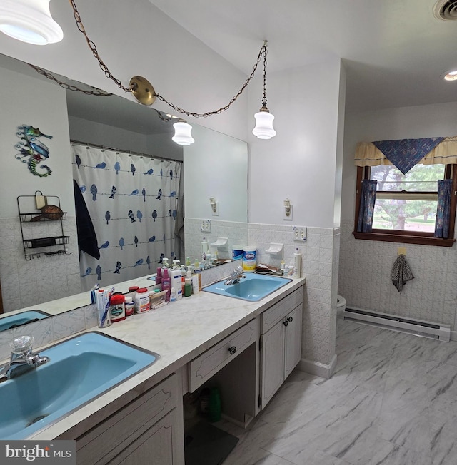 938 Church Hill Rd, Milford, DE 19963 - bathroom with toilet, a baseboard heating unit, a sink, and visible vents