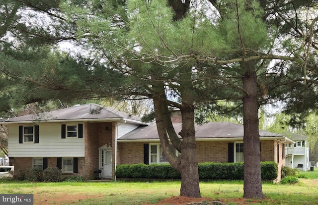 938 Church Hill Rd, Milford, DE 19963 - tri-level home featuring brick siding and a front lawn
