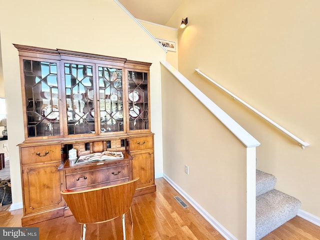 477 Wampum Ln, Hedgesville, WV 25427 - stairs with baseboards, visible vents, wood finished floors, and lofted ceiling