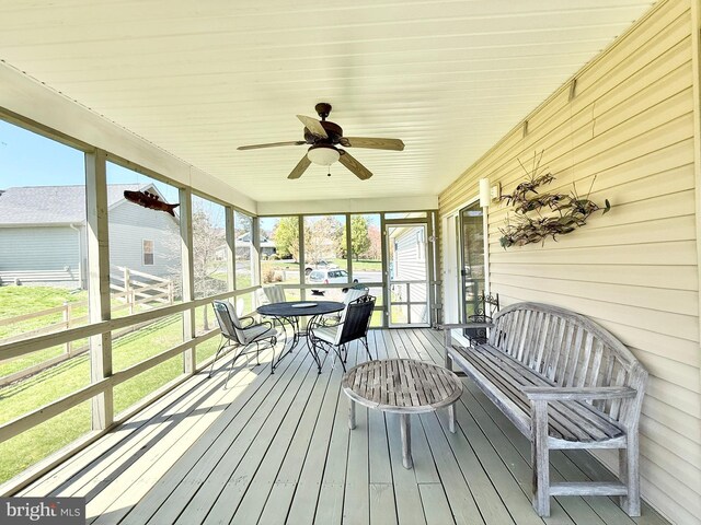 477 Wampum Ln, Hedgesville, WV 25427 - sunroom / solarium featuring plenty of natural light, a ceiling fan, and outdoor dining space