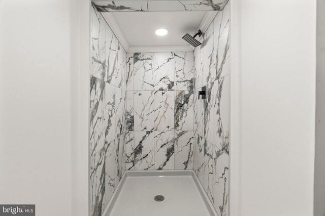 bathroom featuring a stall shower and recessed lighting