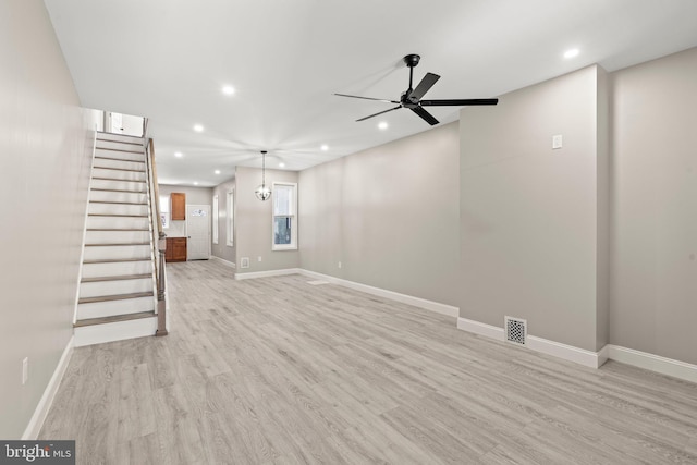 unfurnished living room featuring recessed lighting, light wood-style floors, and a ceiling fan