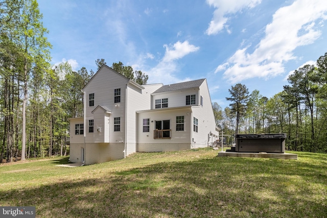 13301 Windjammer Ct, Hughesville, MD 20637 - back of property with a yard and a hot tub