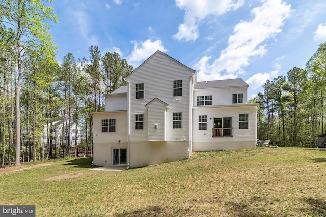 13301 Windjammer Ct, Hughesville, MD 20637 - rear view of property featuring a lawn