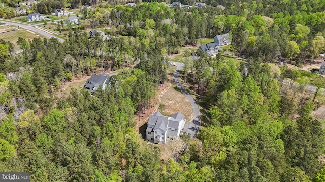 13301 Windjammer Ct, Hughesville, MD 20637 - bird's eye view featuring a wooded view