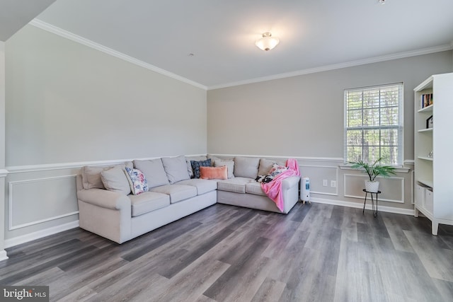 13301 Windjammer Ct, Hughesville, MD 20637 - living area with wood finished floors, a decorative wall, crown molding, and wainscoting
