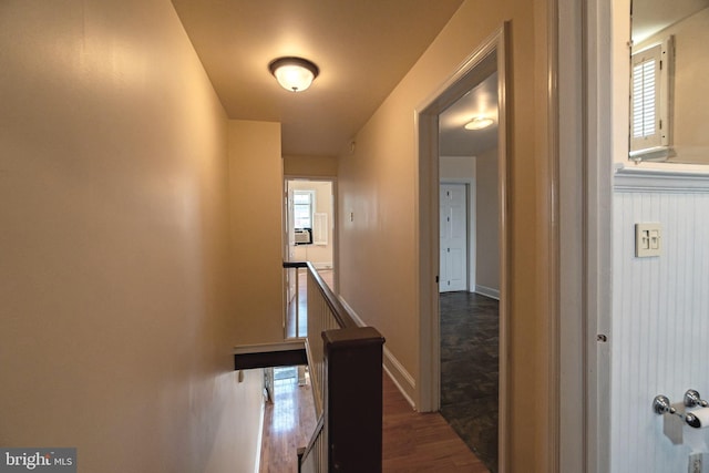 2631 W Gordon St, Philadelphia, PA 19132 - hall with cooling unit, dark wood-style floors, and an upstairs landing