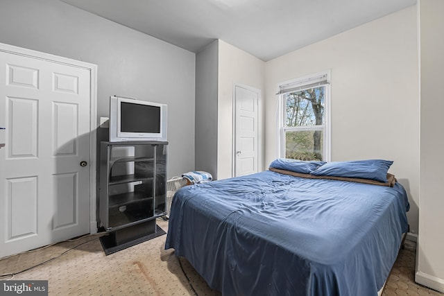 bedroom with baseboards