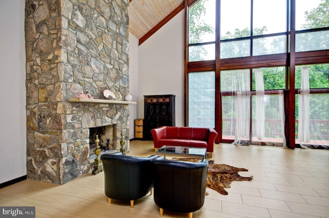 6525 76th St, Cabin John, MD 20818 - living room featuring high vaulted ceiling, a fireplace, wood ceiling, and expansive windows
