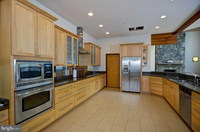 6525 76th St, Cabin John, MD 20818 - kitchen featuring stainless steel appliances, a sink, wall chimney range hood, recessed lighting, and light brown cabinets
