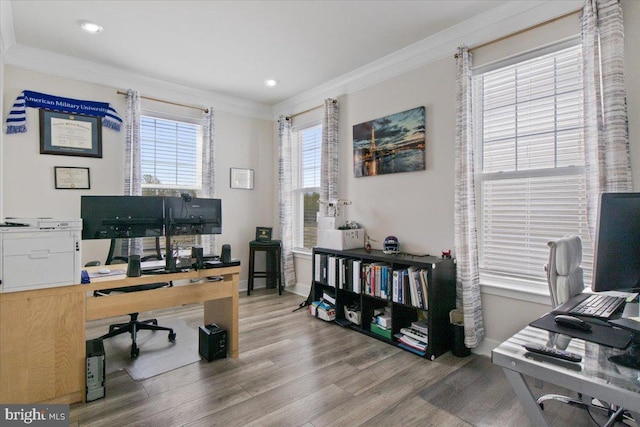 office area with wood finished floors, baseboards, ornamental molding, and recessed lighting