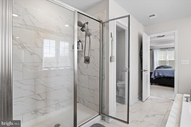 full bathroom featuring visible vents, marble finish floor, connected bathroom, and a stall shower