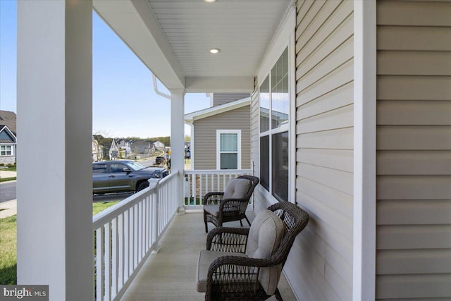 balcony featuring a porch