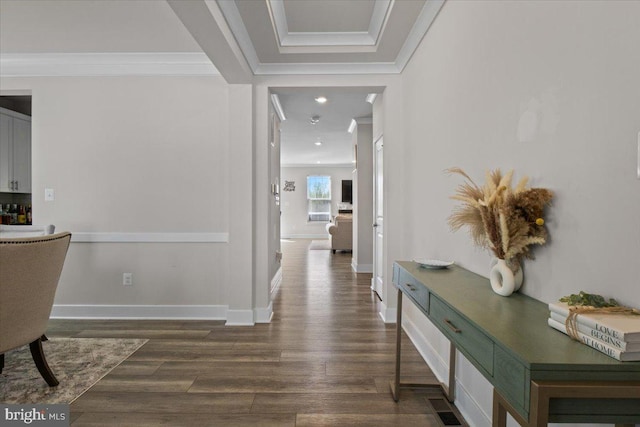 hallway featuring visible vents, baseboards, crown molding, recessed lighting, and dark wood-type flooring