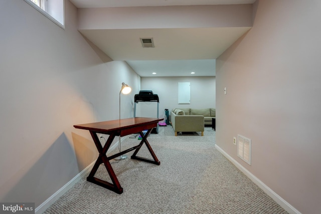 home office featuring baseboards, carpet flooring, and visible vents