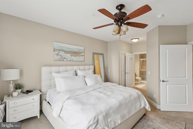 2 N Commerce Sq Unit 303, Trenton, NJ 08691 - bedroom with light colored carpet, ceiling fan, ensuite bath, and baseboards