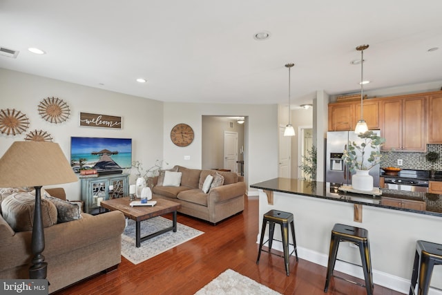 2 N Commerce Sq Unit 303, Trenton, NJ 08691 - living room featuring recessed lighting, baseboards, visible vents, and dark wood finished floors