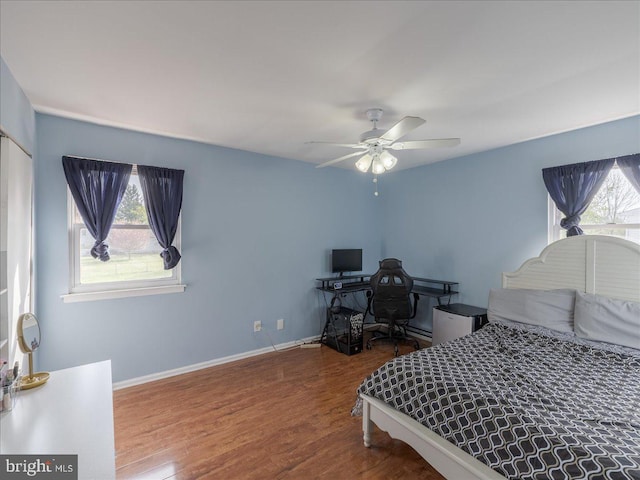 45 Shelley Rd, Southampton, PA 18966 - bedroom featuring wood finished floors, baseboards, a ceiling fan, and multiple windows