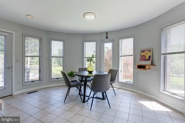 1 Fox Field Ct, Reisterstown, MD 21136 - dining space featuring plenty of natural light, baseboards, light tile patterned flooring, and visible vents