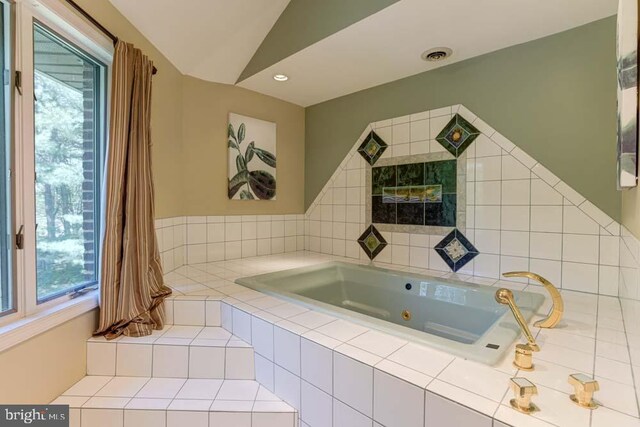 1 Fox Field Ct, Reisterstown, MD 21136 - bathroom with a whirlpool tub, visible vents, a wealth of natural light, and lofted ceiling