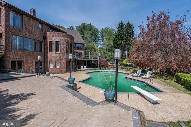 1 Fox Field Ct, Reisterstown, MD 21136 - pool with a diving board and a patio area