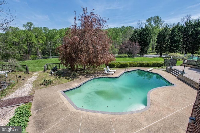1 Fox Field Ct, Reisterstown, MD 21136 - pool with fence, a diving board, a lawn, and a patio area