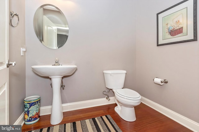 4083 Reels Mill Rd, Frederick, MD 21704 - bathroom with wood finished floors, toilet, and baseboards