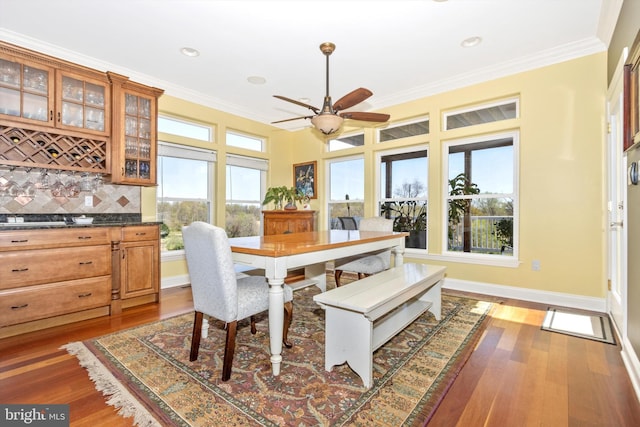 4083 Reels Mill Rd, Frederick, MD 21704 - dining space featuring healthy amount of natural light, crown molding, ceiling fan, wood finished floors, and recessed lighting