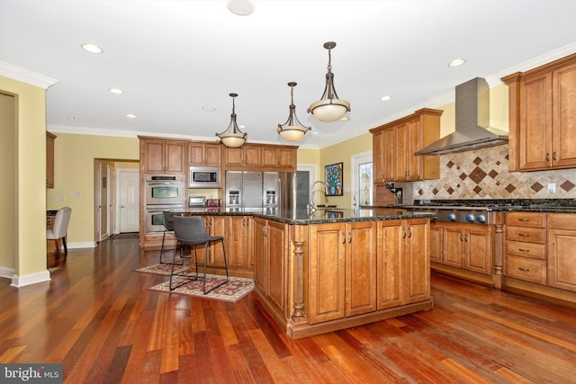 4083 Reels Mill Rd, Frederick, MD 21704 - kitchen featuring wall chimney exhaust hood, appliances with stainless steel finishes, dark wood-style floors, tasteful backsplash, and recessed lighting